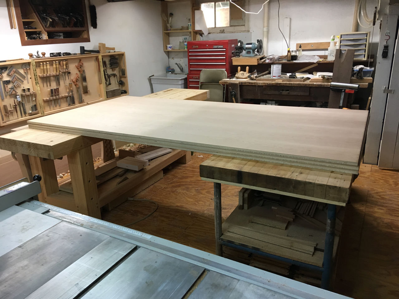 three sheets of cherry plywood