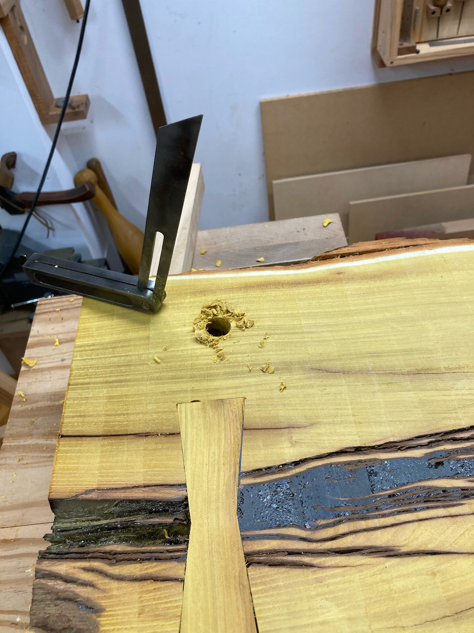 Hole finished from the top to reduce tearout